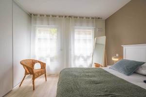 Appartements OVELIA Saint-Etienne - Les Arches de la Montat : photos des chambres