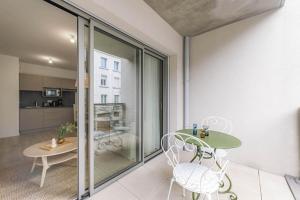 Appartements OVELIA Saint-Etienne - Les Arches de la Montat : photos des chambres