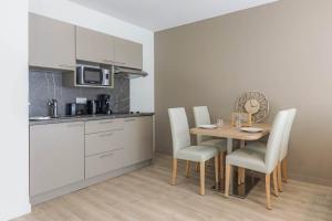 Appartements OVELIA Saint-Etienne - Les Arches de la Montat : photos des chambres