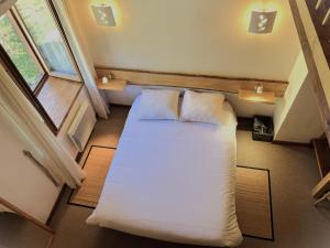 Chalets Le Domaine d'Arignac : photos des chambres