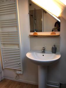 Appartements Appartement coquet dans maison individuelle : photos des chambres