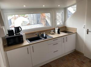 Appartements Studio Le nid de pie : photos des chambres