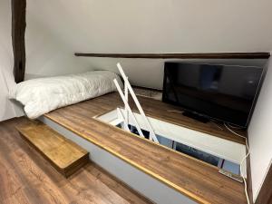 Appartements La petite grange : photos des chambres