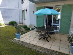 Appartements La Clef du Bonheur - 9 Min de Disney Jardin privatif : photos des chambres