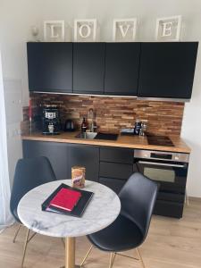 Appartements Suite romantique avec Spa et filet suspendu : photos des chambres