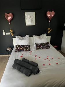 Appartements Suite romantique avec Spa et filet suspendu : photos des chambres