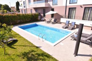 Luxury apartment Grotta with sea view and swimming pool