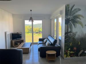 Appartements T3 Vignes & Terrasse 25 m2 au calme - Vue verdoyante - A 7 min de la plage - Parking Gratuit - La Croix-Valmer : photos des chambres