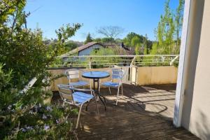 Appartements Appartement solaire duplex avec terrasse en bois : photos des chambres