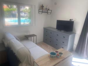 Appartements Studio climatise avec piscine et jardin : photos des chambres