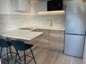 Appartements Studio cosy avec mezzanine : photos des chambres