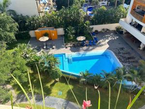 2BR condo in excellent location next to the beach