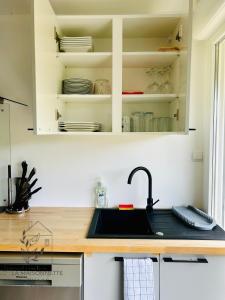 Appartements Maison avec acces au lac : photos des chambres