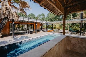 Villas Villa PAPAGAYO, piscine chauffee, jacuzzi & sauna : photos des chambres