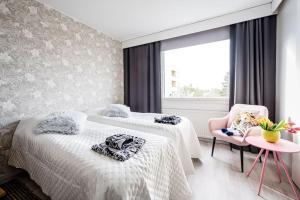 Meren rannalla viihtyisä asunto.