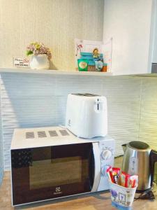 Grand Blue Condominium by Mary