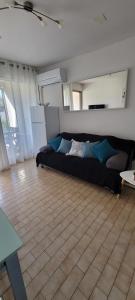 Studio cabine clim rez-de-jardin résid piscine 150 m plage