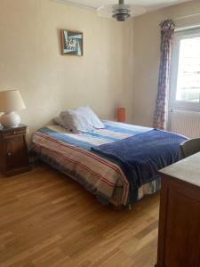Sejours chez l'habitant Maison des roses : photos des chambres