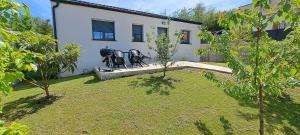 Maisons de vacances Pacific Green-80M2-Clime-2 big Suites-Parking prive 2 cars-Jardin-Confort : photos des chambres