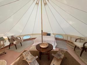 Tentes de luxe Tente lodge en pleine nature : photos des chambres