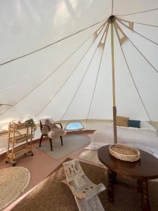 Tentes de luxe Tente lodge en pleine nature : photos des chambres