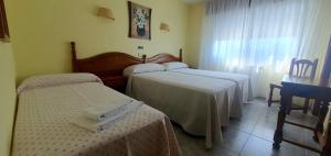 Triple Room (2 Adults + 1 Child) room in Hotel La Costera