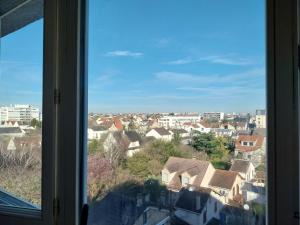 Appartements Studio lumineux 3 min Gare Houilles - RER A, Ligne L et J : photos des chambres