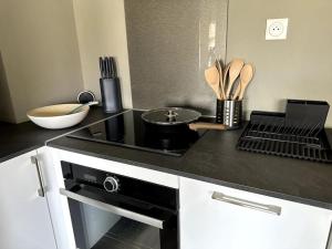 Appartements Entre Vignes et Mer, avec Wifi, Clim et Netflix : photos des chambres