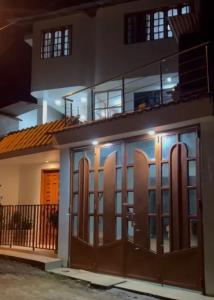 Casa Hospedaje “YURAQ WASI”