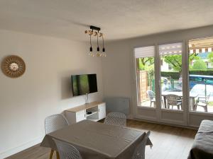 Appartements Agreable T2 en rez de jardin a 2 pas du plan d'eau : photos des chambres