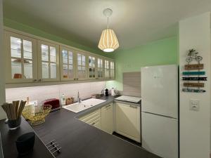 Lé-crin, appartement deux pièces avec jardin