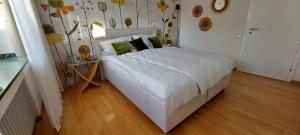 Helle Ferienwohnung mit Garten und Terrasse, direkt am Waldrand gelegen