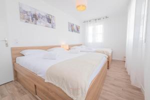 Appartements Disneyland-Paris - 8 personnes, Wifi, Parking : photos des chambres