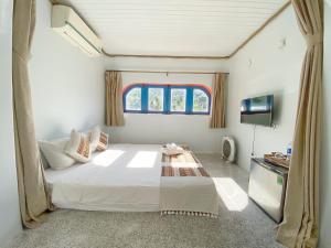 Phòng Giường Lớn có Hướng Vườn (King Room with Garden View)