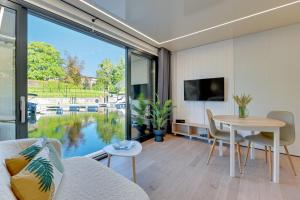 Domy Na Wodzie - La Mare Motlava Houseboats with Sauna by Downtown Apartments