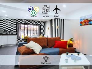 Appartements Duo : Ambiance rebelle et zen, proche RER C & Orly : photos des chambres