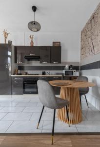 Residence Nature - Appartements design en centre ville : photos des chambres