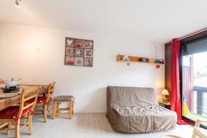 Appartements Le Corbier - studio avec belle vue montagne : photos des chambres