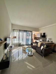 Appartements Superbe 2 pieces avec terrasse : photos des chambres