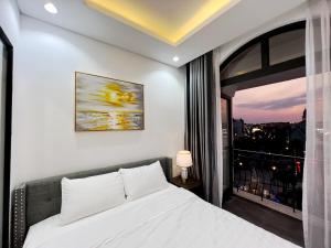Phòng Deluxe Giường Đôi Có Ban Công (Deluxe Double Room with Balcony)