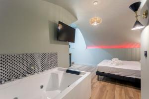 Love hotels Suite Romantique Balneo Centre Lyon : photos des chambres