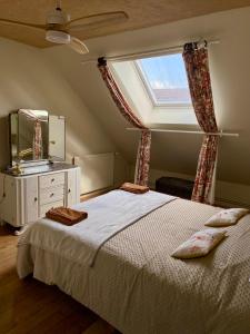 Maisons de vacances Gite de la maison jaune - Comblanchien : photos des chambres
