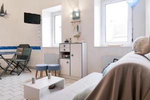 Appartements Appartement idealement situe a deux pas du port de peche ! : photos des chambres