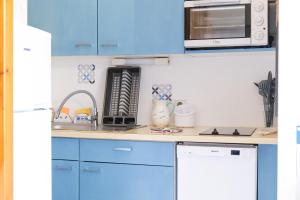 Appartements Appartement idealement situe a deux pas du port de peche ! : photos des chambres