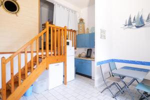 Appartements Appartement idealement situe a deux pas du port de peche ! : photos des chambres