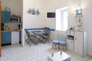 Appartements Appartement idealement situe a deux pas du port de peche ! : photos des chambres