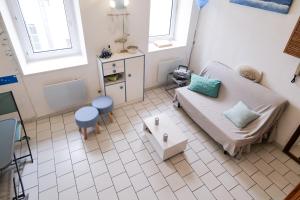 Appartements Appartement idealement situe a deux pas du port de peche ! : photos des chambres