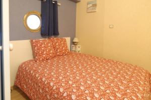 Appartements Appartement idealement situe a deux pas du port de peche ! : photos des chambres