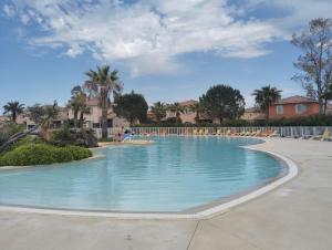 Maisons de vacances Le Domaine du Golf ***. Lieu-dit Launac-Le-Vieux 1 chemin de l'Aire 34690 FABREGUES : photos des chambres