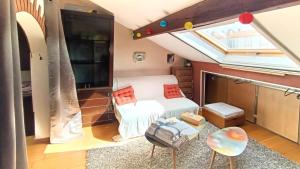 Appartements Coquet 2 pieces sous les toits : photos des chambres